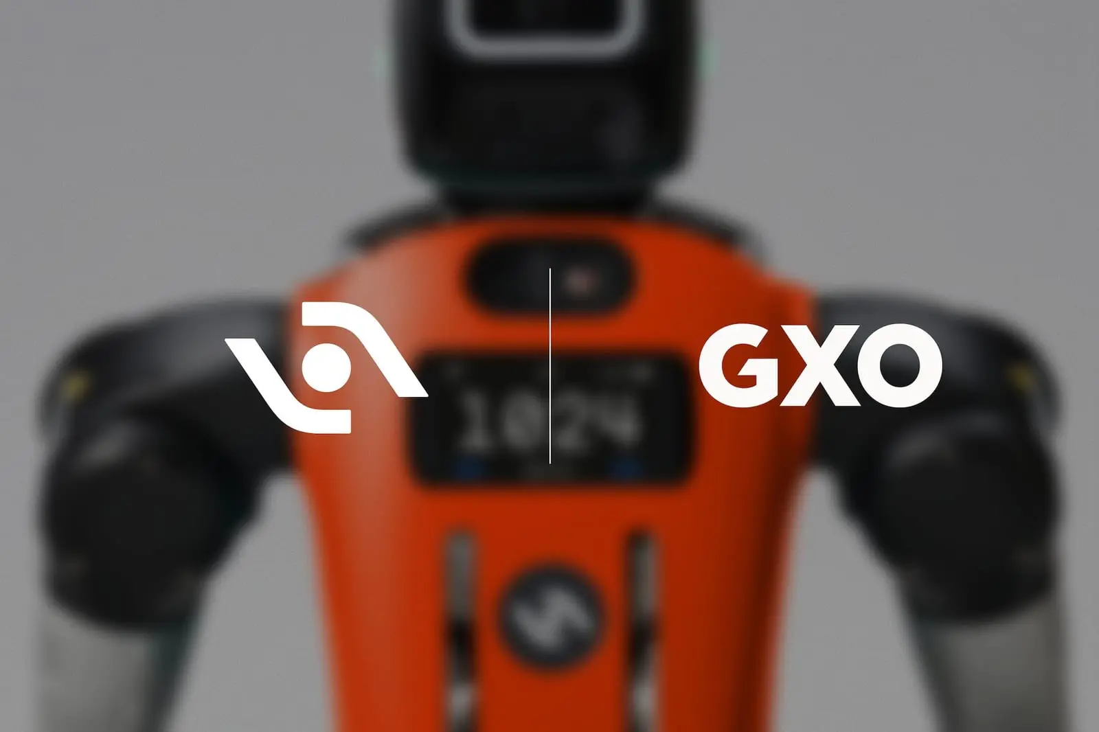 Close view of an orange Digit humanoid robot torso with the Agility Robotics and GXO logos overlaid in white.